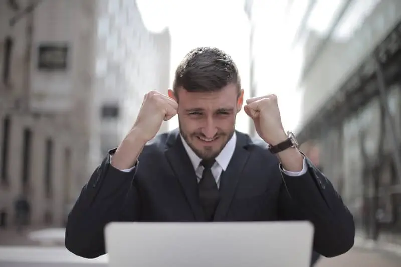 The_Importance-of-Data-Access-Control-in-Salesforce-1 Man looking at computer_AutoRABIT