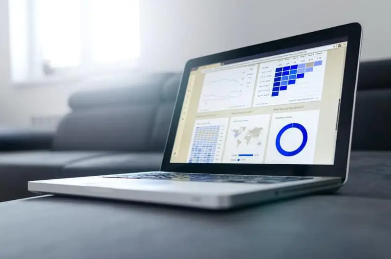 7-Best-Practices-for-Backing-up-Your-Salesforce-Data-2 Laptop computer and graphs_AutoRABIT