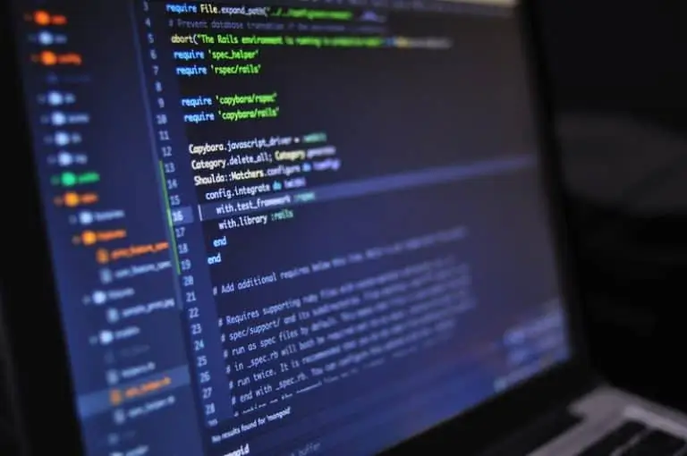 Moving-Beyond-Clicks-Not-Code-in-Salesforce-1-768x510-1 Code on a screen_AutoRABIT