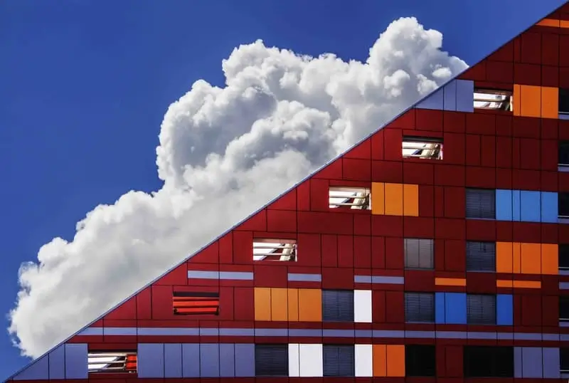 Clouds behind an office building_AutoRABIT